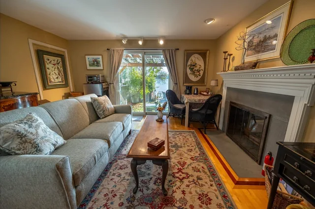 Living room of the Lovely Waterfront Seacoast Suite with a water view